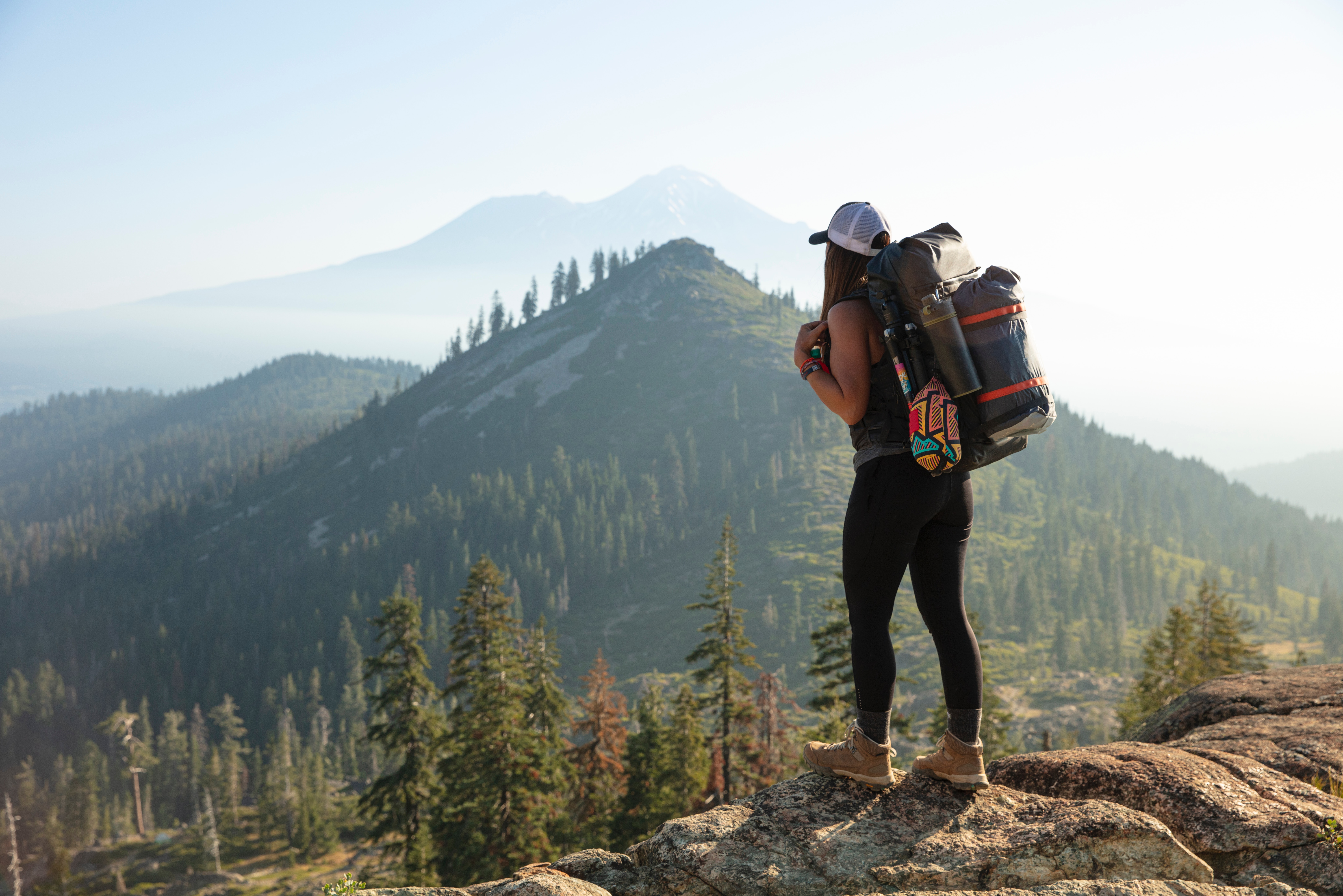 woman hiking carrying backpack